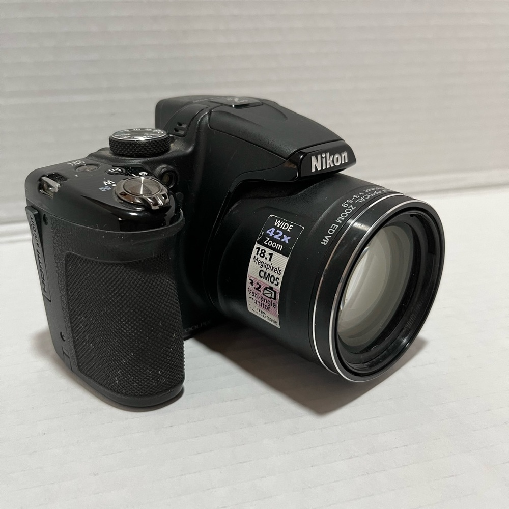 Black used untested Nikon,  Coolpix 520